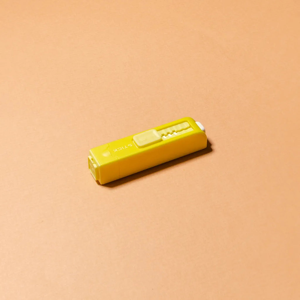 gomme stick milan jaune taille-crayon integre foglietto papeterie en ligne
